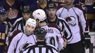 T J  Galiardi checks Andrei Loktionov into the bench HD