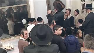 Bitchkov Rebbe Saying Halel With Children Next To His Menorah - Chanukah 5785