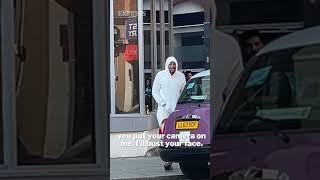 Insane moment migrant threatens to smash Express reporter's face outside asylum hotel