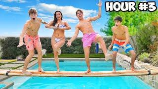 LAST TO FALL IN THE POOL WINS $1,000 CHALLENGE! **FREEZING**