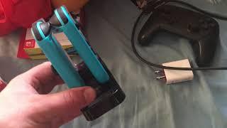 The dobe fomis electronics dock station for the Nintendo switch controllers