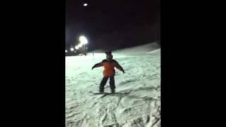 Alan snowboarding at 7