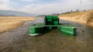 Hydrokinetic Floating Water Wheel in Shallow River