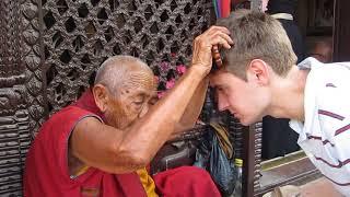 Blessed by female Buddhist monk in Nepal