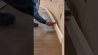 Curved wall wood Baseboard installation  Gpr3Carpentry