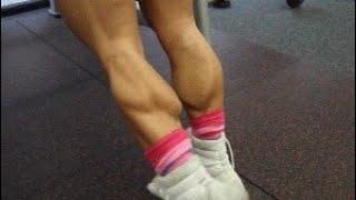 FBB Katka Kyptova flexing shredded calves