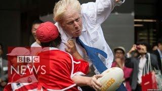 Boris Johnson takes out boy in rugby - BBC News