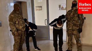 Russia Releases Video It Claims Shows Crocus City Hall Attack Suspects Taken For Questioning