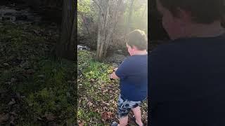 My son shooting the slingshot