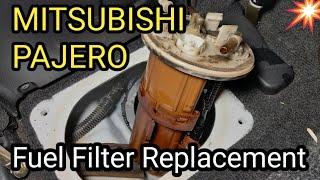 Replace fuel filter Mitsubishi Pajero (petrol) in tank filter,