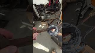 Heating a railroad spike on the induction forge using pancake coil. Its crazy how fast it heats up!