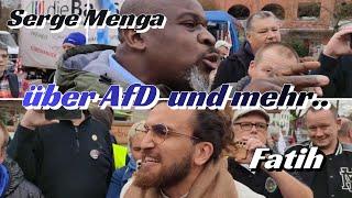 Serge Menga diskutiert mit AfD kritischen Moslem Fatih 22.2.25 Backnang Quelle: @spunktnews