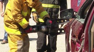 Firefighters learn how to use "jaws of life"