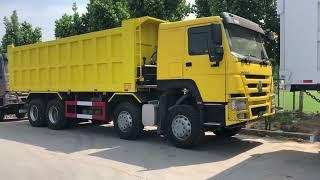 Sinotruk Zimbabwe Howo 8x4 tipper truck 400hp 60 tons price