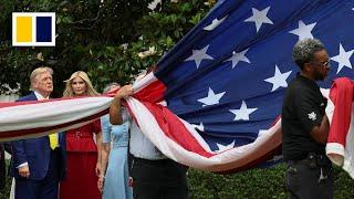 Trump shows off giant flagpoles at White House