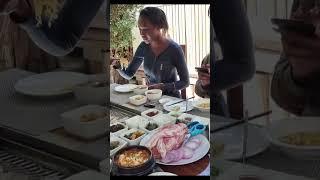 Teaching African Girl How To Use Chopsticks