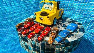 Disney Pixar Cars falling into deep pool, Lightning McQueen, Tow Mater, Mack, Sally, Francesco