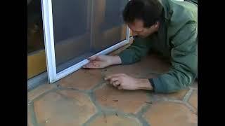 Putting a Sliding Screen Door in Track