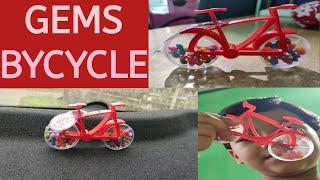 GEMS Bycycle | Red Bycycle with Gems | Drishti's Weblog