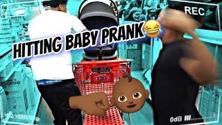 HITTING BABY IN TARGET PRANK!! WE ALMOST GOT KICKED OUT!