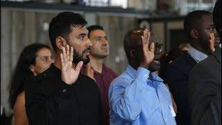 New Canadians take Oath of Citizenship at ceremony tied to Capital Pride