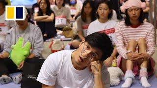 Space-Out competition in Hong Kong attracts dozens to sit still and do nothing for 90 minutes