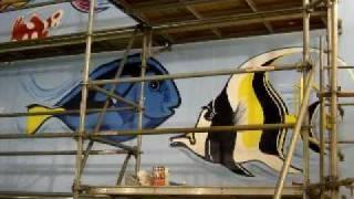 Edmonton Artist building the Edmonton Jasper Place mural