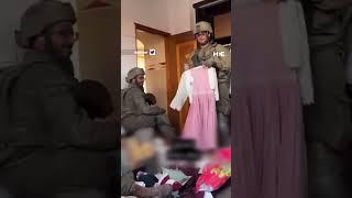 Video shows Israeli soldiers trying on Palestinian children’s clothes