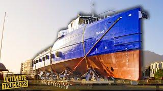 Trailer Moves 313 Tonne Ship Through Narrow City Intersection