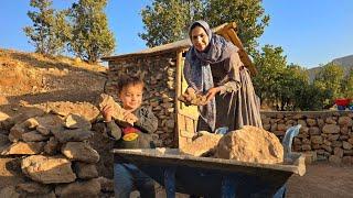 A nomadic mother's hard day building a shelter for her sheep: Documentary