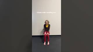 What are some yoga moves I can do in my chair to protect my spine?