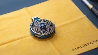 Assembly process of jewelry pendant in the form of a car wheel. Materials, Titanium and gold