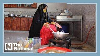 Emirati women prepare traditional food to showcase UAE's heritage