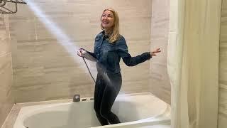 Wetlook Getting wet in the shower in wet Levis jeans and a denim shirt #shower #jeans #wet #girl