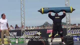 Big Z World log lift record 228kg in front of Arnold Schwarzenegger