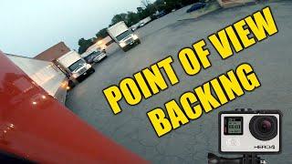 Watch out box truck, tractor trailer backing.   Rookie Trucking Life.