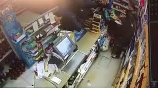 Premier shop owner robbed at knife point and defends himself with string