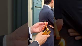 Cutting and lighting the Cigarrito at our exclusive black tie dinner in Florence 