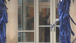 Heavily armored officers enter Highland Park High School amid lockdown