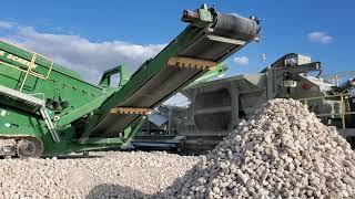 McCloskey R155 Screening Lime Rock into Lippmann 4800R Impact Crusher into ST80TLA Radial Conveyors.