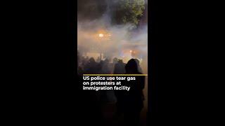 US police use tear gas on protesters at immigration facility | AJ#shorts