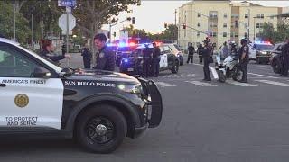 Two suspects in custody, one at large after man shot at SDSU trolley station