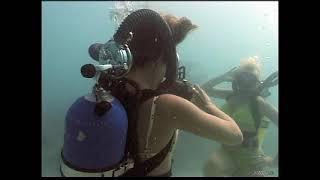 Tracie and Hope scuba diving