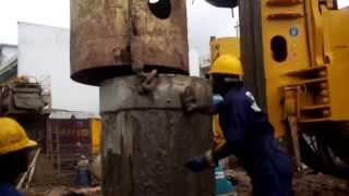 Hydraulic piling rig - Installation of a Casing pipe