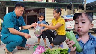 Single mother harvests cucumbers and vegetables to sell at the market