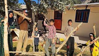 Akram and Her Kids Build a Shade Roof to Keep Water Tanks Cool