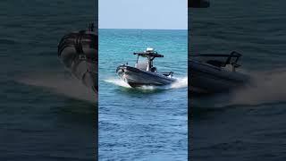 The world famous officer George navigates the wavy Haulover Inlet