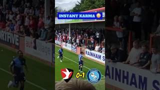 INSTANT KARMA FOR CHELTENHAM!  Joe Jacobson’s Iconic Wycombe corner