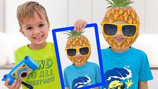 Vlad and Niki play with photos | Funny videos for kids