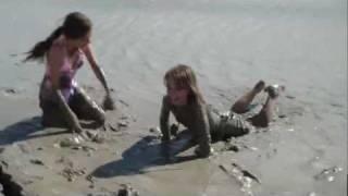 Girls playing in mud